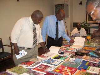 College staff examining books