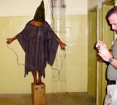 Cloaked torture victim at Abu Ghraib