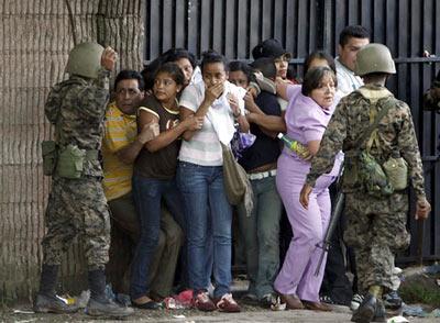 Scared civilians cornered by police